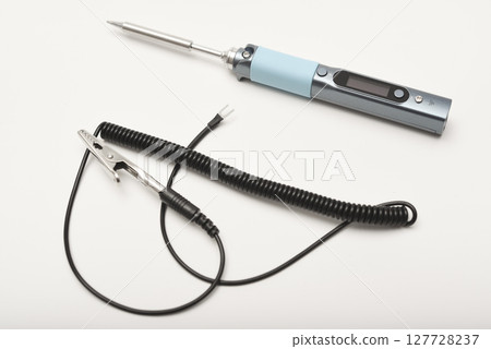 New electronic soldering irons with stingers. Soldering iron with a grounding wire. New electronic soldering irons with stingers. Soldering iron with a grounding wire. 127728237