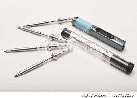 New electronic soldering irons with stingers. Modern tin soldering tools. 127728239