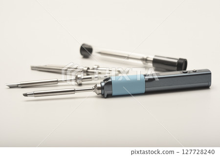 New electronic soldering irons with stingers. Modern tin soldering tools. 127728240