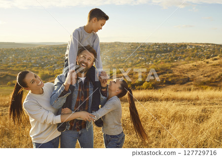 Happy family together group portrait on beautiful nature background 127729716