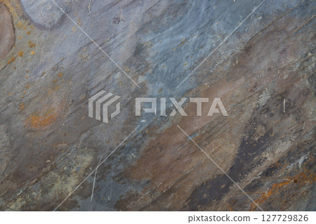 Textured Layered Stone Background with Rust Colors. Abstract Rock Surface 127729826