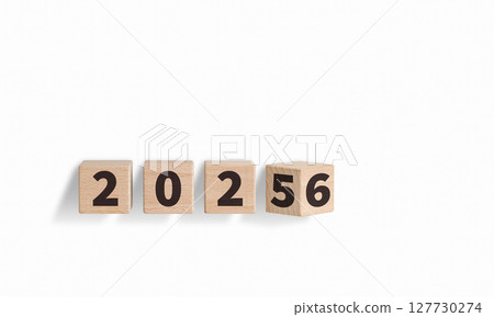 Wooden Blocks with 2025-2026 Text on White Background for New Year Celebration 127730274