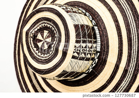 Traditional hat from Colombia called Sombrero vueltiao. Colombian concept. Colombian culture concept. Background Traditional hat from Colombia called Sombrero vueltiao. Colombian concept. Colombian culture concept. Background 127730687