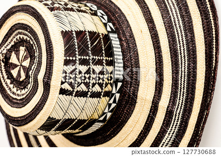 Traditional hat from Colombia called Sombrero vueltiao. Colombian concept. Colombian culture concept. Background 127730688