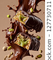 Dubai Chocolate Pistachio Bars with Kataifi Dough. Broken in half with rich, glossy melted chocolate coating and a golden crispy texture underneath, luxury food advertising style. AI Generative 127730711
