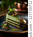 Dark Chocolate cake with cream and pistachio, dubai chocolate style 127730712