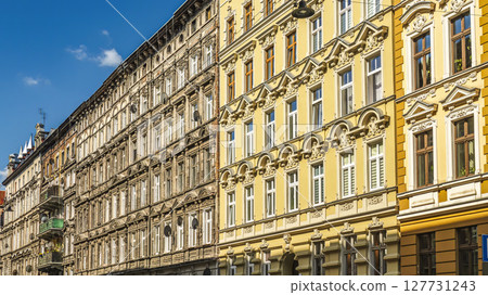 Colorful Historic Apartment Buildings With Ornate Facades and Wrought Iron Balconies Colorful Historic Apartment Buildings With Ornate Facades and Wrought Iron Balconies 127731243