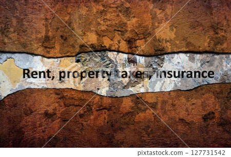 Rent property tax insurance text on wall 127731542