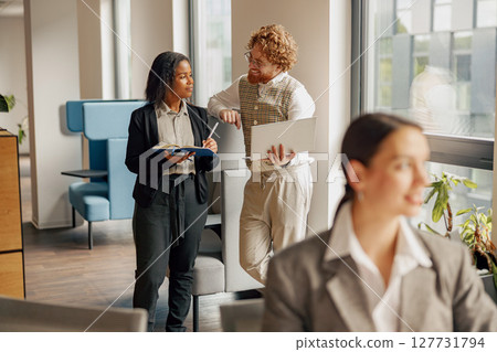 Professional Team Collaboration within a Modern Office Space Environment for Optimal Outcomes Professional Team Collaboration within a Modern Office Space Environment for Optimal Outcomes 127731794