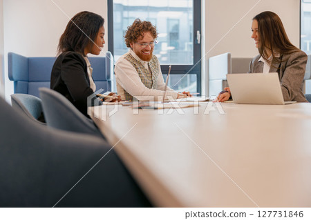 Join a Business Meeting that fosters Diverse Team Collaboration for success and innovation 127731846