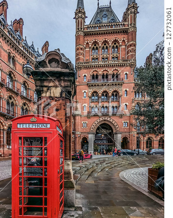 A tower of St Pancras International Railway Station against cloudy sky. London, UK. A tower of St Pancras International Railway Station against cloudy sky. London, UK. 127732061