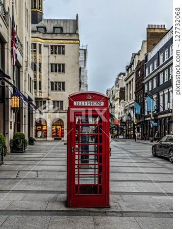 London Red Telephone Boxes on the Street. Black and White Buildings and Street with Red London Telephone Boxes 127732068