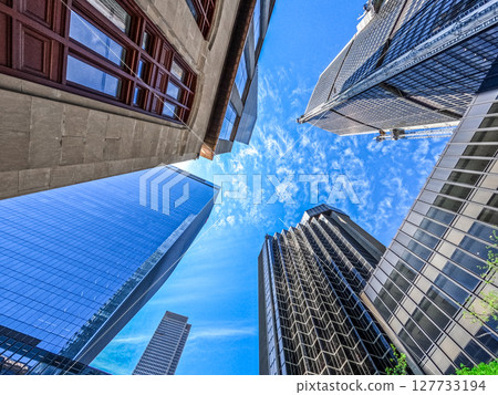 Montreal skyline seen from streets looking up at buildings Montreal skyline seen from streets looking up at buildings 127733194
