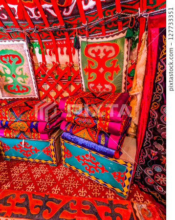 Interior decoration of the yurt. Living room with stove. traditional Uzbek yurt insideInterior decoration of the yurt. Living room with stove. traditional Uzbek yurt inside 127733351