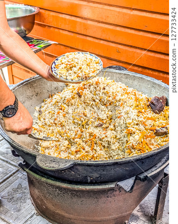 street food uzbek rice plaf with beef street food uzbek rice plaf with beef 127733424
