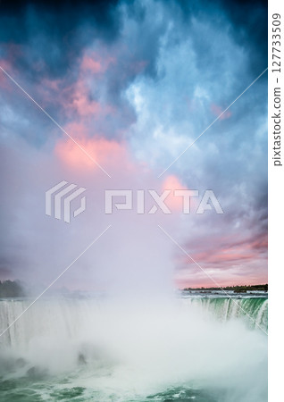Canadian side view of Niagara Falls, Horseshoe Falls in a sunny day in Niagara Falls, Ontario, Canada Canadian side view of Niagara Falls, Horseshoe Falls in a sunny day in Niagara Falls, Ontario, Canada 127733509
