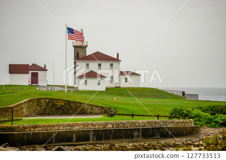 Watch Hill Light in Rhode Island Surrounded by a Stone Seawall 127733513