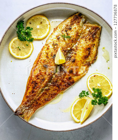Plump and juicy sole meunière 127736878