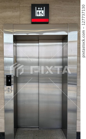 modern elevator in commercial building with sleek design and accessibility features for all users. 127737130
