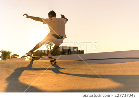 Surf skater training surfing moves 127737342