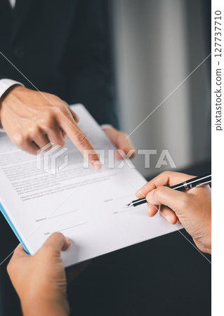 Business people signing contract making deal with life insurance agent Concept for consultant health insurance life insurance savings plan. Approved stamp with Business people contract making deal Business people signing contract making deal with life insurance agent Concept for consultant health insurance life insurance savings plan. Approved stamp with Business people contract making deal 127737710