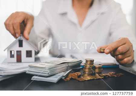 Concept business house finance protection office plan investment buy sell home ensuring idea financial security. residence agent hand protect purchase insurance and secure favorable loan deal. 127737759