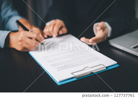 Business people signing contract making deal with life insurance agent Concept for consultant health insurance life insurance savings plan. Approved stamp with Business people contract making deal Business people signing contract making deal with life insurance agent Concept for consultant health insurance life insurance savings plan. Approved stamp with Business people contract making deal 127737761