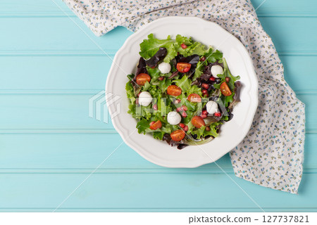 Green salad on plate Green salad on plate 127737821
