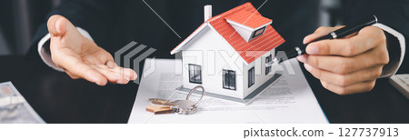 Concept business house finance protection office plan investment buy sell home ensuring idea financial security. residence agent hand protect purchase insurance and secure favorable loan deal. banner 127737913