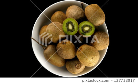 Kiwi in a white mug Kiwi in a white mug 127738017