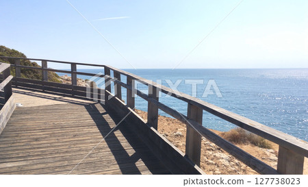 Wooden walkway to beautiful Carvoeiro beach Wooden walkway to beautiful Carvoeiro beach 127738023