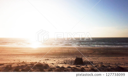 Aerial view of beach at sunset 127738099