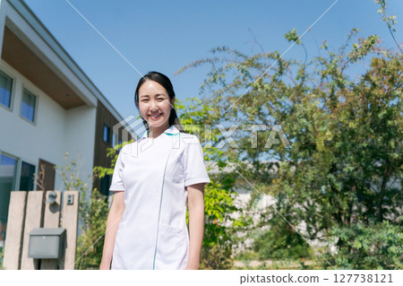 Women working as visiting nurses Women working as visiting nurses 127738121