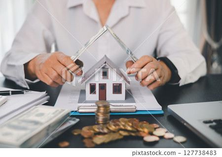 Concept business house finance protection office plan investment buy sell home ensuring idea financial security. residence agent hand protect purchase insurance and secure favorable loan deal. 127738483