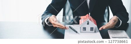 Concept business house finance protection office plan investment buy sell home ensuring idea financial security. residence agent hand protect purchase insurance and secure favorable loan deal. banner 127738661