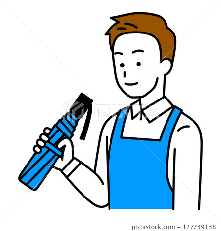 A man in an apron holding a folding umbrella 127739138