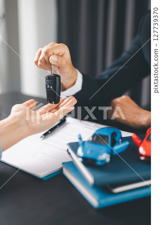 Concept business vehicle finance protection office plan investment buy sell car ensuring idea financial security. automobile agent hand protect purchase insurance and secure favorable loan deal. 127739370