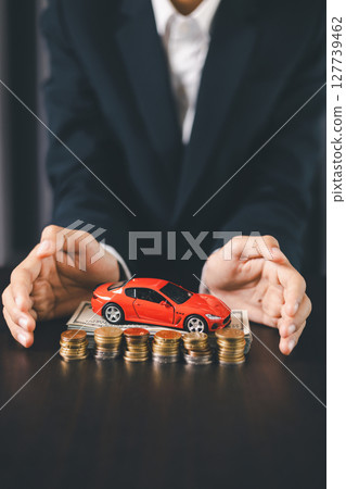 Concept business vehicle finance protection office plan investment buy sell car ensuring idea financial security. automobile agent hand protect purchase insurance and secure favorable loan deal. 127739462