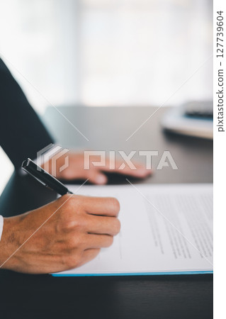 Business people signing contract making deal with life insurance agent Concept for consultant health insurance life insurance savings plan. Approved stamp with Business people contract making deal Business people signing contract making deal with life insurance agent Concept for consultant health insurance life insurance savings plan. Approved stamp with Business people contract making deal 127739604