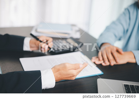 Business people signing contract making deal with life insurance agent Concept for consultant health insurance life insurance savings plan. Approved stamp with Business people contract making deal Business people signing contract making deal with life insurance agent Concept for consultant health insurance life insurance savings plan. Approved stamp with Business people contract making deal 127739669