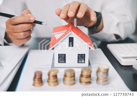 Concept business house finance protection office plan investment buy sell home ensuring idea financial security. residence agent hand protect purchase insurance and secure favorable loan deal. Concept business house finance protection office plan investment buy sell home ensuring idea financial security. residence agent hand protect purchase insurance and secure favorable loan deal. 127739743