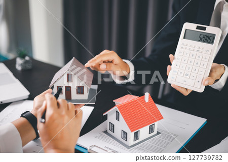 Concept business house finance protection office plan investment buy sell home ensuring idea financial security. residence agent hand protect purchase insurance and secure favorable loan deal. 127739782