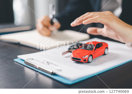 Concept business vehicle finance protection office plan investment buy sell car ensuring idea financial security. automobile agent hand protect purchase insurance and secure favorable loan deal. Concept business vehicle finance protection office plan investment buy sell car ensuring idea financial security. automobile agent hand protect purchase insurance and secure favorable loan deal. 127740069