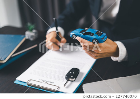 Concept business vehicle finance protection office plan investment buy sell car ensuring idea financial security. automobile agent hand protect purchase insurance and secure favorable loan deal. Concept business vehicle finance protection office plan investment buy sell car ensuring idea financial security. automobile agent hand protect purchase insurance and secure favorable loan deal. 127740070