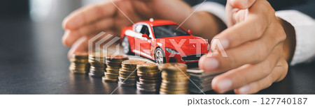 Concept business vehicle finance protection office plan investment buy sell car ensuring idea financial security. automobile agent hand protect purchase insurance and loan deal. banner with copy space Concept business vehicle finance protection office plan investment buy sell car ensuring idea financial security. automobile agent hand protect purchase insurance and loan deal. banner with copy space 127740187