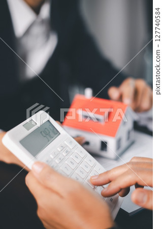 Concept business house finance protection office plan investment buy sell home ensuring idea financial security. residence agent hand protect purchase insurance and secure favorable loan deal. Concept business house finance protection office plan investment buy sell home ensuring idea financial security. residence agent hand protect purchase insurance and secure favorable loan deal. 127740584