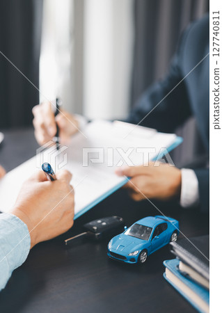 Concept business vehicle finance protection office plan investment buy sell car ensuring idea financial security. automobile agent hand protect purchase insurance and secure favorable loan deal. 127740811