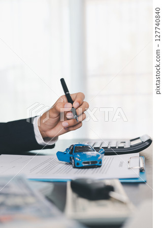 Concept business vehicle finance protection office plan investment buy sell car ensuring idea financial security. automobile agent hand protect purchase insurance and secure favorable loan deal. 127740840