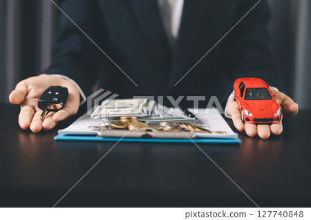 Concept business vehicle finance protection office plan investment buy sell car ensuring idea financial security. automobile agent hand protect purchase insurance and secure favorable loan deal. 127740848