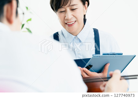 Middle-aged women checking their nutritional balance 127740973